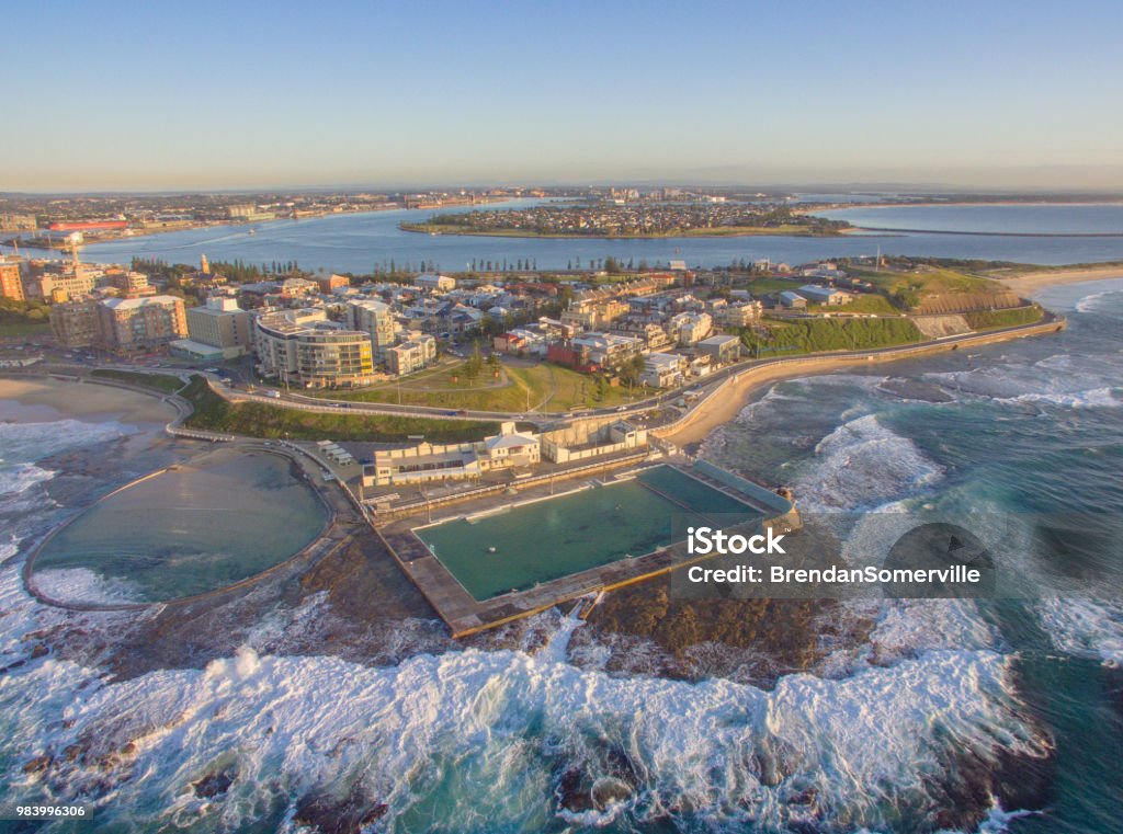 Newcastle Ocean Baths at Sunrise Aerial shot of Newcastle Baths, NSW, Australia at Sunrise Newcastle - New South Wales Stock Photo