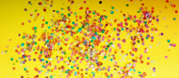 istock festive background of confetti, Frame made of colored confetti. 984003096