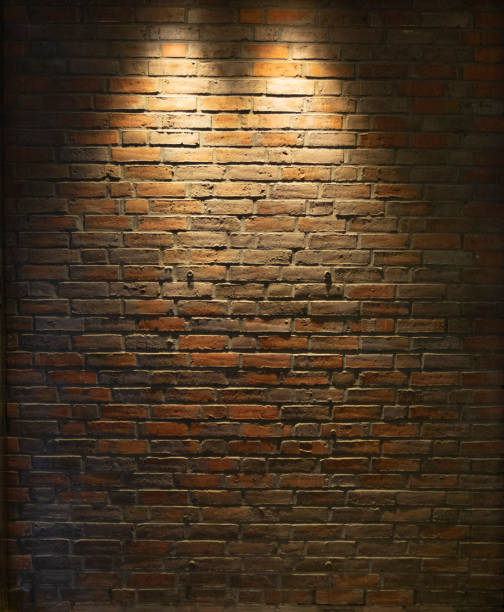 lighted brick wall background - accent wall imagens e fotografias de stock