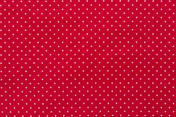 istock Polka dot on red canvas cotton texture, fabric background 984011720