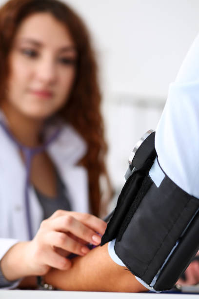 istock Female doctor arms make medic procedure closeup. 984018762
