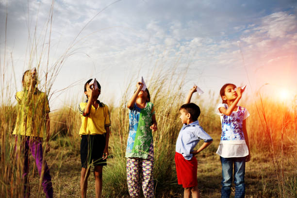 istock Child playing outdoor in the nature 984020328