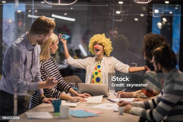 Playful Businesswoman Making A Clown Of Herself On A Meeting In The Office Stock Photo - Download Image Now
