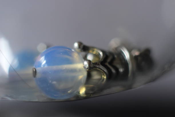 istock Silver earrings with glass stone in macro 984035910