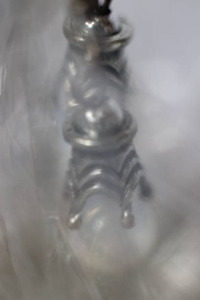 Silver earrings with glass stone in macro