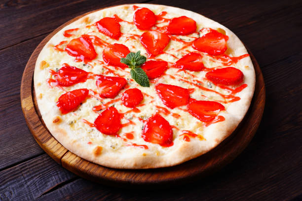 istock Seasonal strawberry pizza close up 984039218