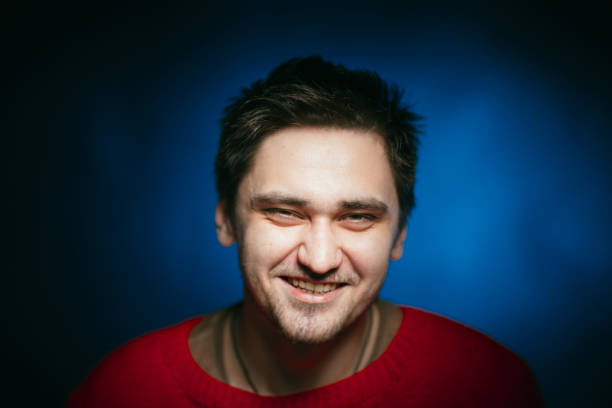 istock emotional young man photo in studio 984046490