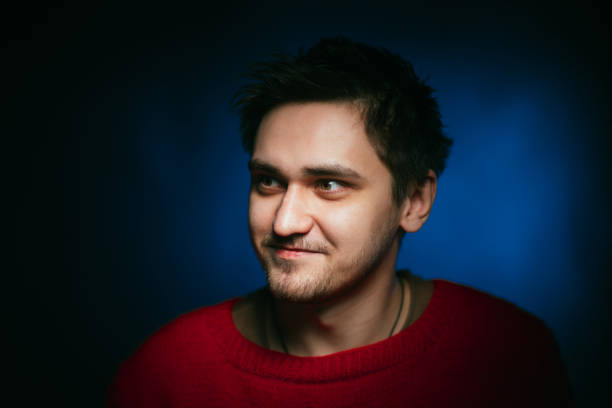 istock emotional young man photo in studio 984047492
