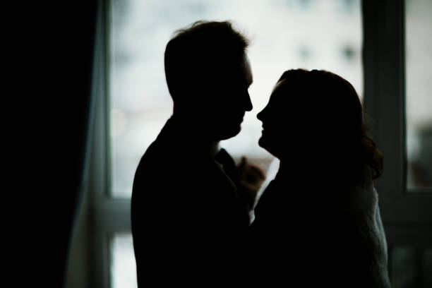 istock young bride and groom couple in a bright studio photo 984054286