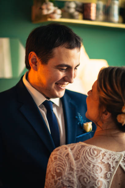 istock couple groom and bride in light studio 984060452