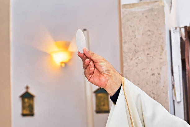 istock Catholic religious ceremony of Eucharist - selective focus 984069820