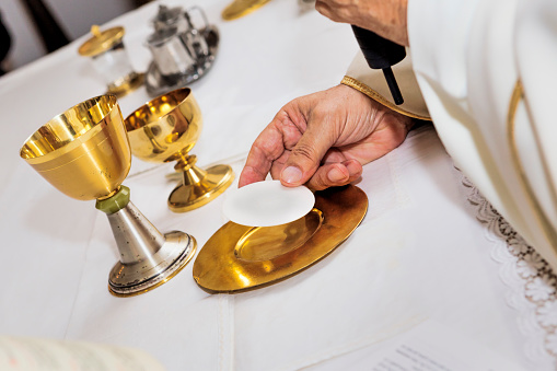 Catholic religious ceremony of Eucharist - selective focus