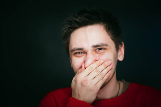 istock emotional young man photo in studio 984070942