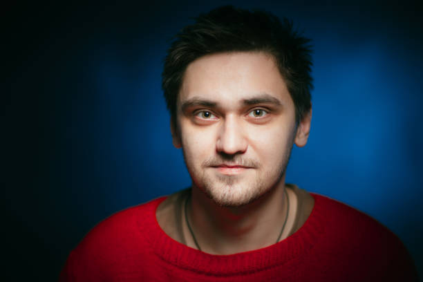 istock emotional young man photo in studio 984074474