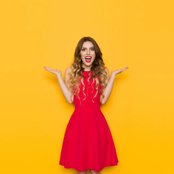 istock Surprised And Happy Young Woman Is Holding Hands Raised And Shouting 984088090
