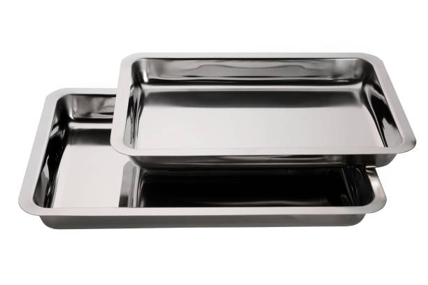 Set of stainless square trays on white background. Empty silver serving trays