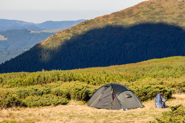istock Tent in the hikers camp in Carpathian mountains 984093404