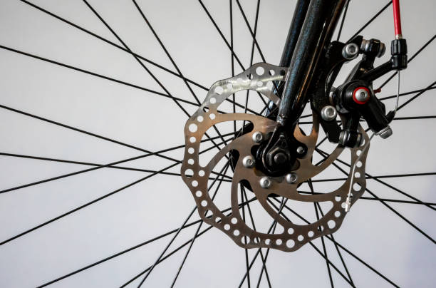 istock bicycle wheel spoke detail isolated on white background 984093964