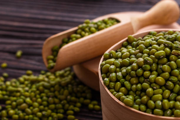 istock fresh Mung beans on a rustic wooden background 984098770