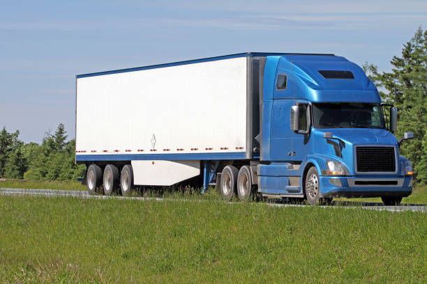 istock Semi Truck Travelling On Highway 984106272