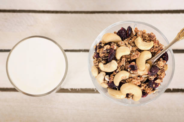 istock Cup of yogurt with granola. Healthy breakfast. Top view 984112356