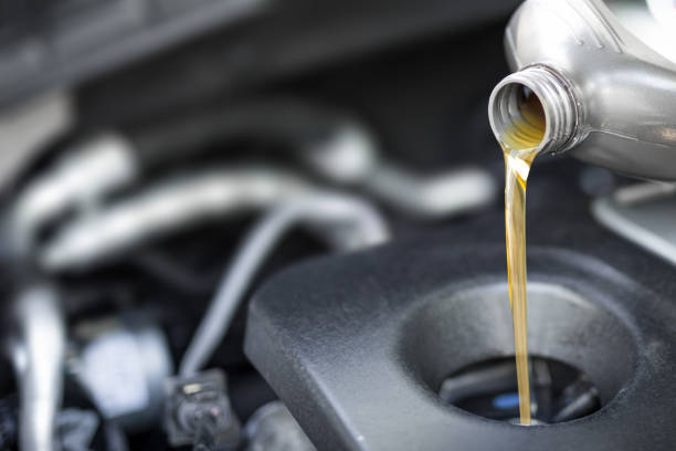 istock Motor oil pouring. 984120374