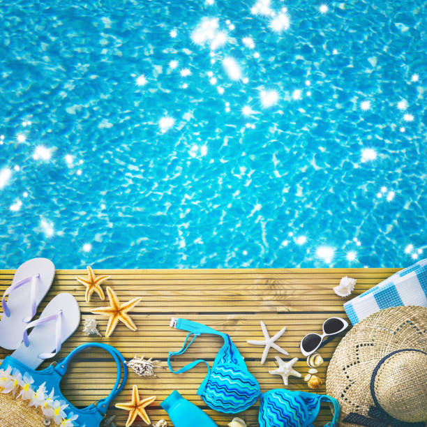 istock Straw hat, sunglasses and other beach accessories 984129982