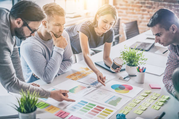 istock Young creative business people meeting at office. 984133224