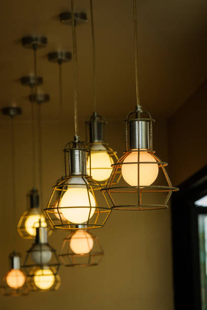 istock Old light bulbs and bokeh light background close up. 984140070