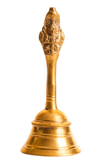 istock old golden hand bell over a white background 984140520