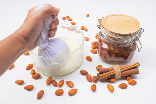 Soak the almonds in a bowl to make almond milk. stock photo