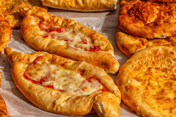 istock khachapuri with cheese and egg on a plate 984187776