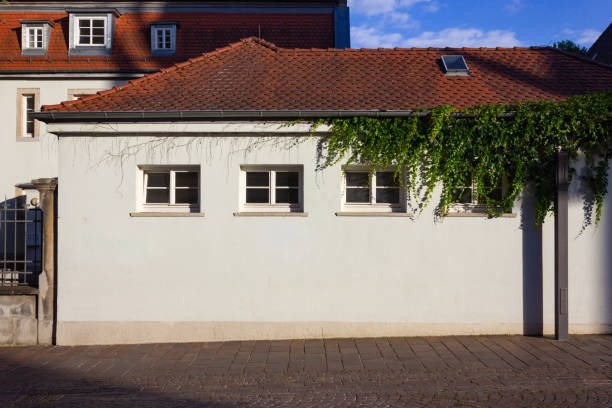 Partial windows of white buildings