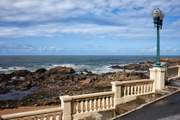 istock Ocean Coast With Balustrade And Street Lamp 984221684