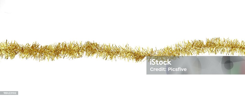 christmas decoration tinsel ornament new year christmas gold decoration hanging  on white background with clipping path Tinsel Stock Photo