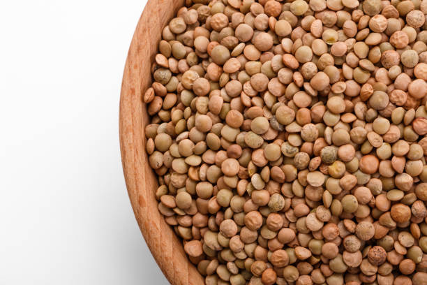 istock raw lentils on a white acrylic background 984234746