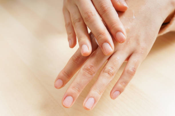 istock Woman applying cream 984245522