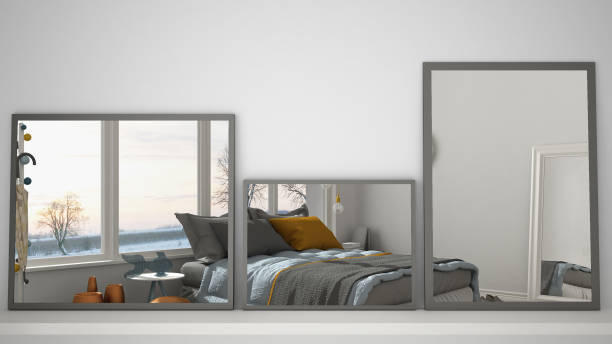 istock Three modern mirrors on shelf or desk reflecting interior design scene, bedroom with big panoramic window, minimalist white architecture interior design 984253718