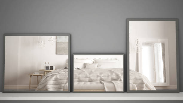 istock Three modern mirrors on shelf or desk reflecting interior design scene, classic contemporary bedroom, minimalist white architecture interior design 984254014