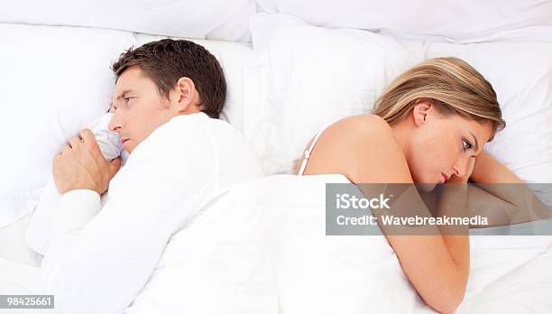 Sad Couple After Having An Argument Stock Photo - Download Image Now - Adult, Bed - Furniture, Bedroom