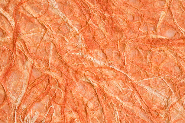 Handmade orange grunge paper stock photo