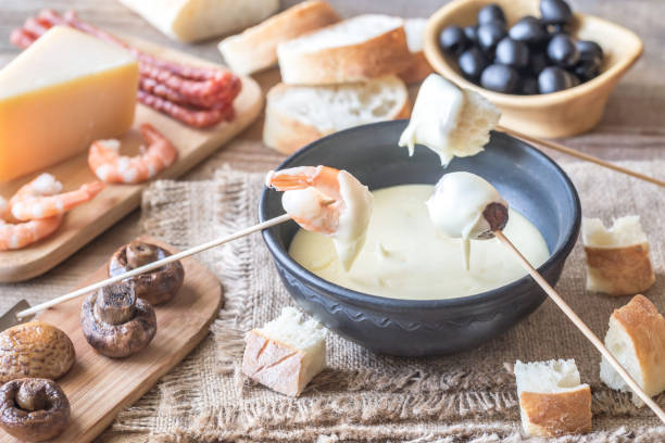 istock Bowl of fondue with appetizers 984263748