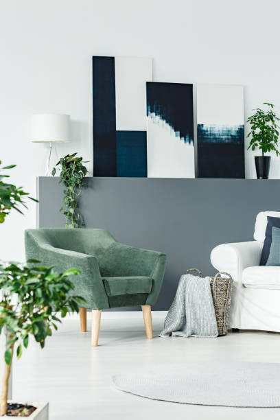 istock Green armchair in room 984267652