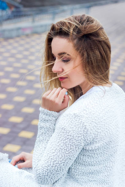 istock A single and sad woman is sitting thinking about life 984267708