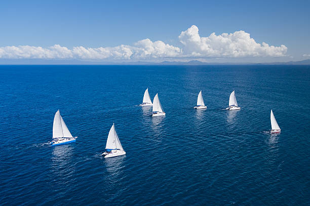 Regatta in indian ocean Regatta in indian ocean, sailboat and catamaran. Helicopter view sailboat photos stock pictures, royalty-free photos & images