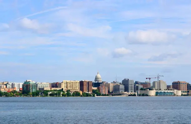 Photo of American city skyline and architecture background.