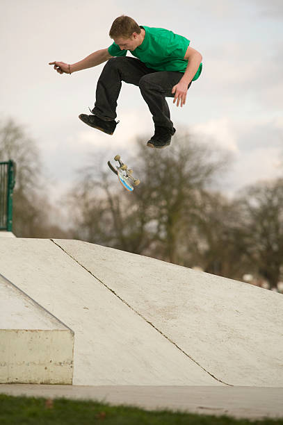 istock Skateboarder flips over a ramp 98427275