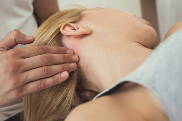 istock Woman having neck massage 984280466