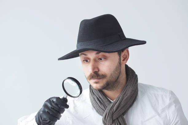 istock Man with the magnifying glass 984281772