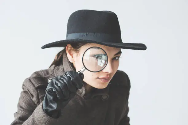 Photo of Woman with the magnifying glass